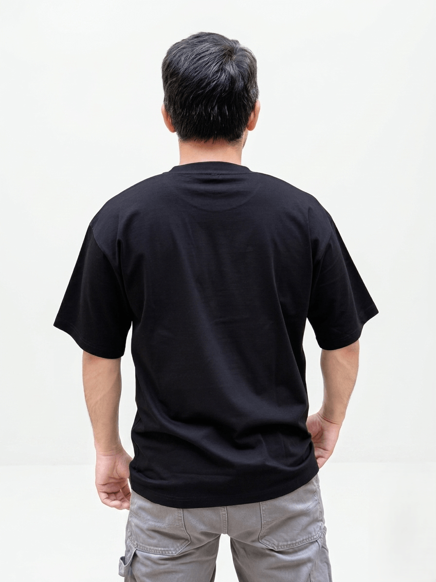 Men’s black oversized minimal blue graphic T-shirt back view