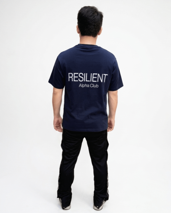 Navy blue oversized men’s graphic t-shirt back view with premium white print streetwear design