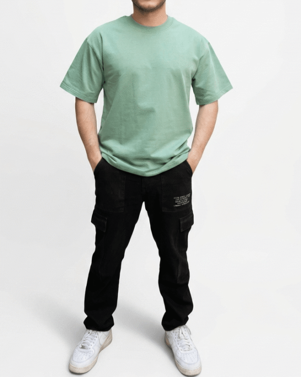 Sage green oversized minimal plain unisex t-shirt front view for everyday streetwear styling