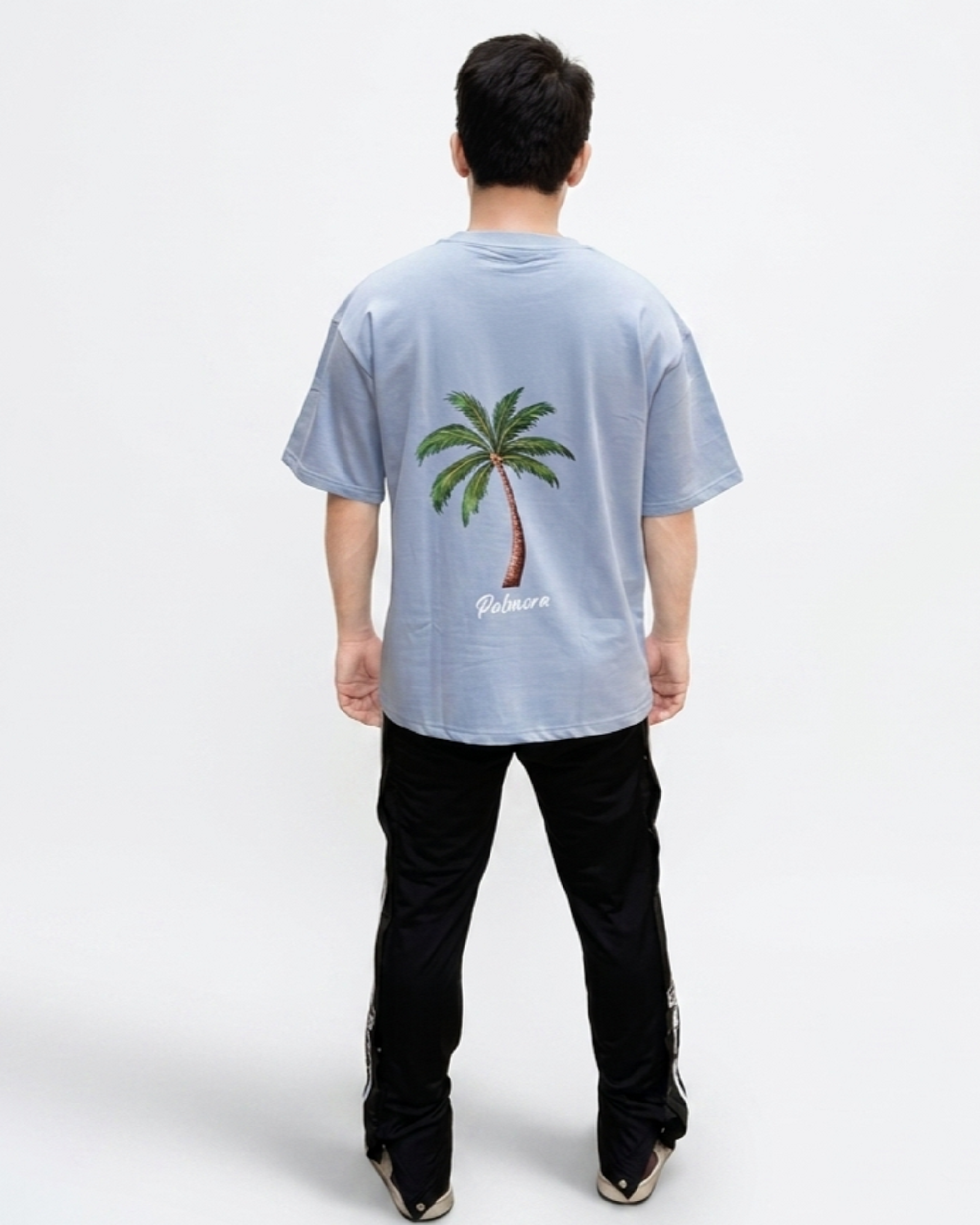 Sky Blue Oversized Graphic T-Shirt Back View with White Print – Premium Cotton Unisex Streetwear Tee
