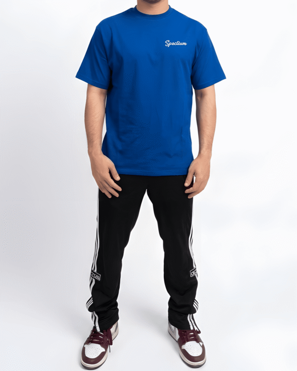 Royal blue oversized unisex white graphic print t-shirt front view with modern streetwear artwork
