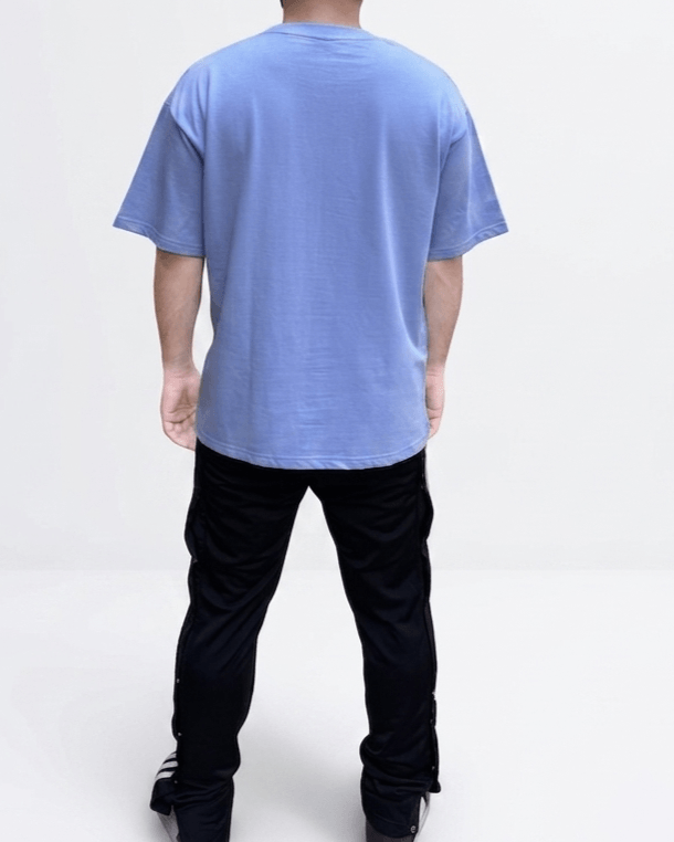 Back view of a sky blue oversized embroidered T-shirt with a comfortable oversized fit and premium cotton construction.